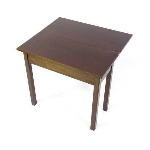 1371 - A Georgian mahogany tea table with a hinged top above four chamfered legs. 32