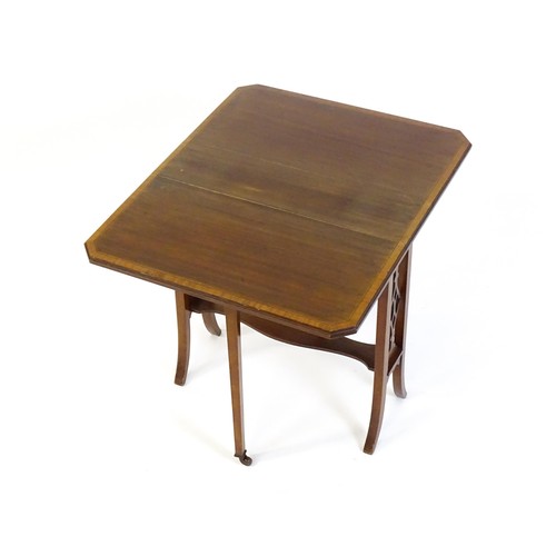 1368 - An early 20thC mahogany Sutherland table with canted leaves, pierced sides and splayed legs. 24