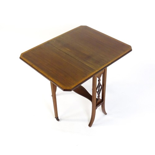 1368 - An early 20thC mahogany Sutherland table with canted leaves, pierced sides and splayed legs. 24