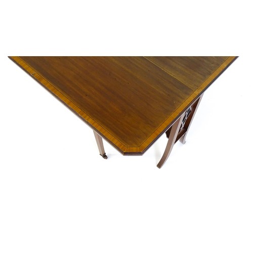 1368 - An early 20thC mahogany Sutherland table with canted leaves, pierced sides and splayed legs. 24