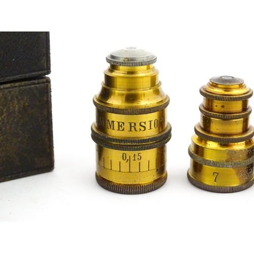 1146 - An early 20thC Leitz microscope, constructed from brass with a cast iron base, the mount stamped 'E.... 