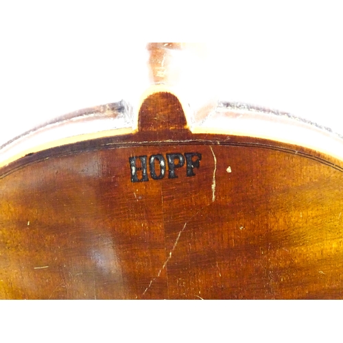 1147 - A mid 19thC violin, constructed from maple and bearing Hopf pyrograph mark below the heel, together ... 