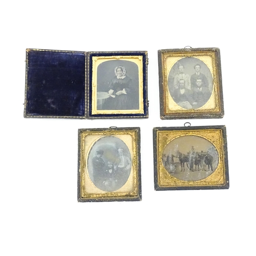 1163 - Four Victorian daguerreotype photographs to include a portrait of a seated woman holding a fan, grou... 