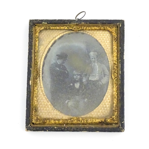 1163 - Four Victorian daguerreotype photographs to include a portrait of a seated woman holding a fan, grou... 