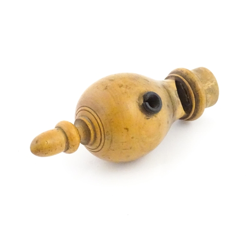 1167 - A Victorian treen boxwood whistle with acorn finial. Approx. 5