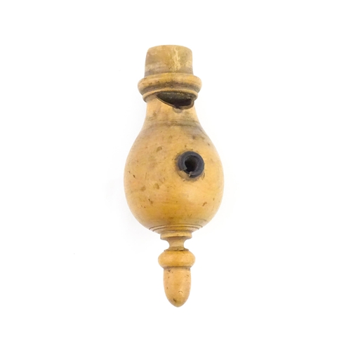 1167 - A Victorian treen boxwood whistle with acorn finial. Approx. 5