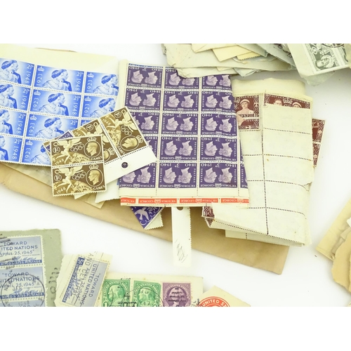 1195 - A large quantity of 19thC and later postage stamps and albums, to include two Penny Black stamps, on... 