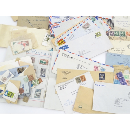 1195 - A large quantity of 19thC and later postage stamps and albums, to include two Penny Black stamps, on... 