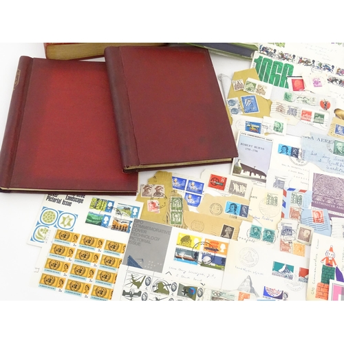 1195 - A large quantity of 19thC and later postage stamps and albums, to include two Penny Black stamps, on... 