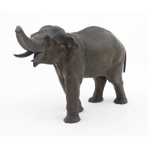 1200 - A 20thC Continental cast and patinated model of an elephant. Marked Kayser under foot. Approx. 10