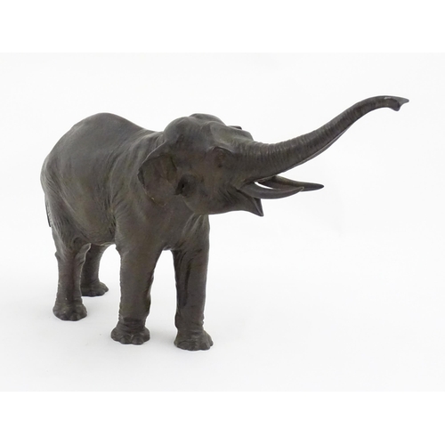 1200 - A 20thC Continental cast and patinated model of an elephant. Marked Kayser under foot. Approx. 10