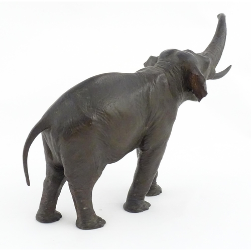 1200 - A 20thC Continental cast and patinated model of an elephant. Marked Kayser under foot. Approx. 10