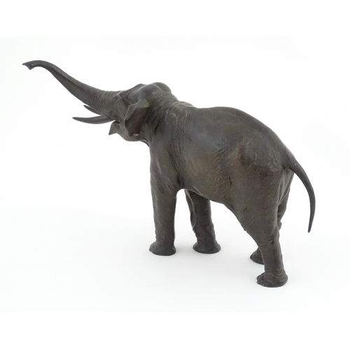 1200 - A 20thC Continental cast and patinated model of an elephant. Marked Kayser under foot. Approx. 10