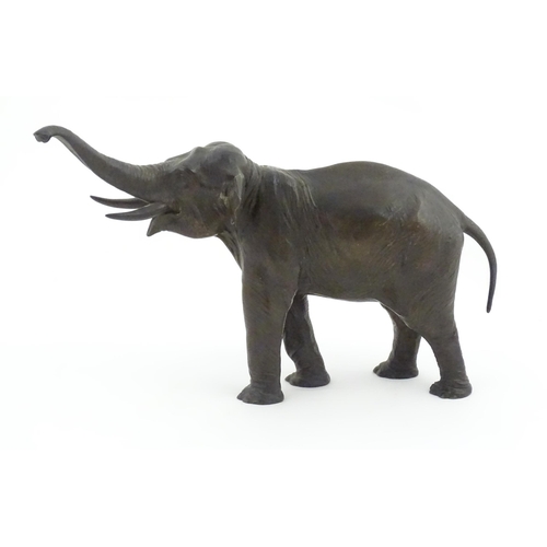 1200 - A 20thC Continental cast and patinated model of an elephant. Marked Kayser under foot. Approx. 10