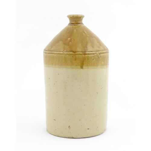 1205 - An early 20thC stoneware two tone flagon with spout lower, marked J. H. Clare Aylesbury 44. Approx. ... 