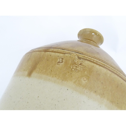 1205 - An early 20thC stoneware two tone flagon with spout lower, marked J. H. Clare Aylesbury 44. Approx. ... 