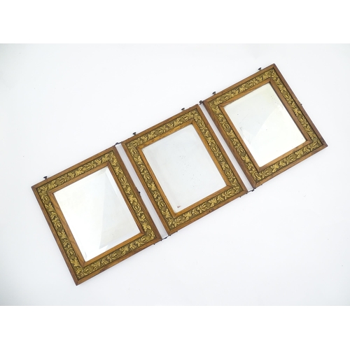 1222 - 20thC three fold oak mirrors with banded foliate detail. Each panel approx. 14