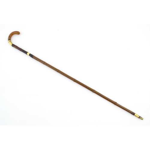 1248 - An early 20thC swordstick, the bamboo shank concealing a 24 3/8