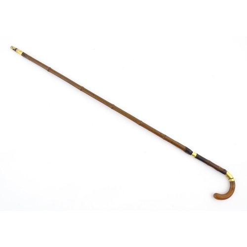 1248 - An early 20thC swordstick, the bamboo shank concealing a 24 3/8