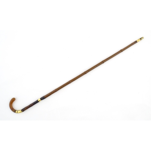 1248 - An early 20thC swordstick, the bamboo shank concealing a 24 3/8