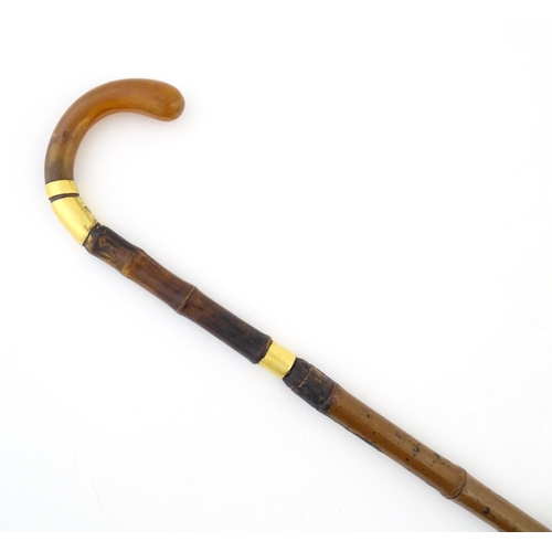 1248 - An early 20thC swordstick, the bamboo shank concealing a 24 3/8