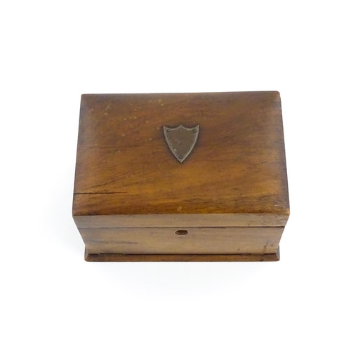 1184 - An early 20thC walnut fall front jewellery box, the hinged lid opening to reveal a fitted interior a... 