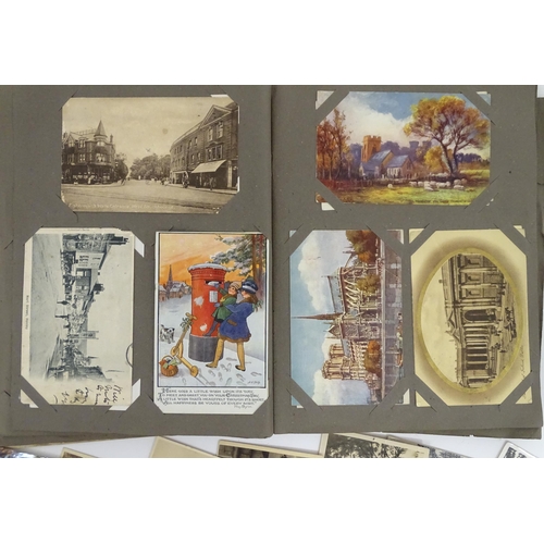 993 - A late 19thC - early 20thC postcard album containing pictorial and photographic postcards, subjects ... 