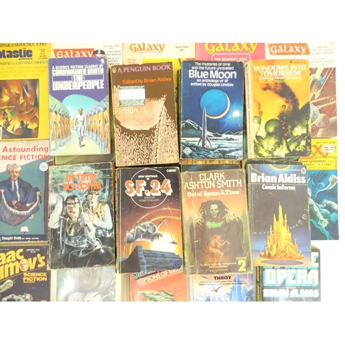 974 - Books: a quantity of mid to late 20thC Science Fiction paperbacks, comprising: Of Time and Stars by ... 