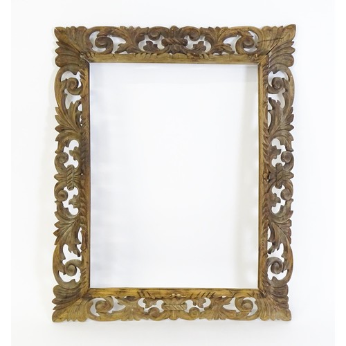 1852 - An early 20thC carved oak frame with pierced scrolling foliate border. Aperture approx. 35