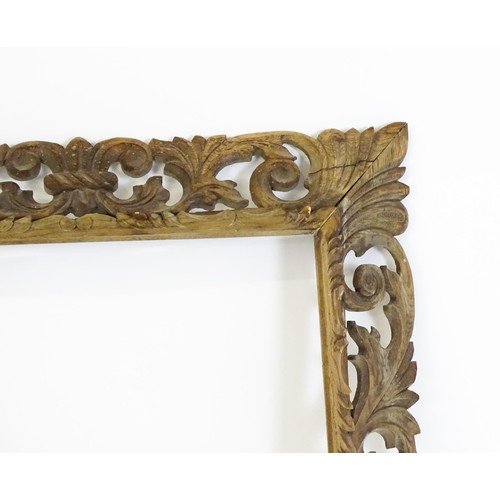 1852 - An early 20thC carved oak frame with pierced scrolling foliate border. Aperture approx. 35