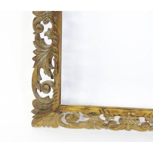 1852 - An early 20thC carved oak frame with pierced scrolling foliate border. Aperture approx. 35