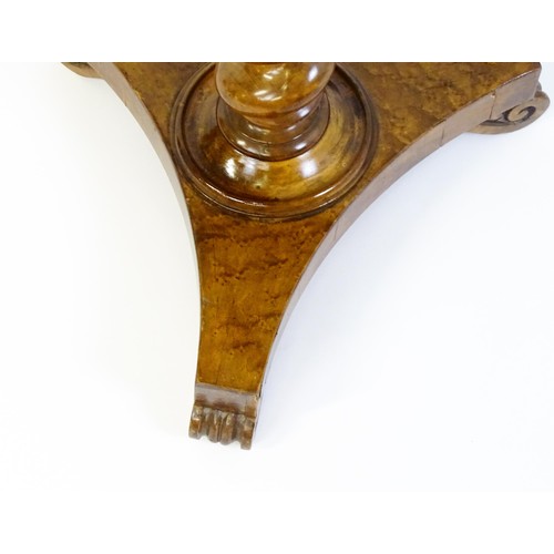 1396 - A 19thC tripod table with a circular top inlaid with a chessboard, floral decoration and a carved su... 