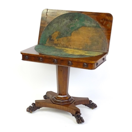 1331 - A 19thC mahogany card table with a rectangular top above applied, carved roundel decoration with a c... 