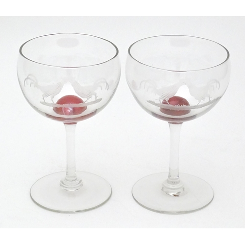 188 - Six 19thC wine glasses, each decorated with cockfighting scenes and cherry detail to the stem top. A... 