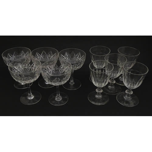 207 - Five cut glass champagne coupes together with five cut glass pedestal wine glasses. Approx 4 1/2