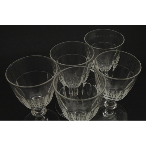 207 - Five cut glass champagne coupes together with five cut glass pedestal wine glasses. Approx 4 1/2