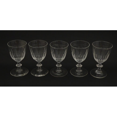 207 - Five cut glass champagne coupes together with five cut glass pedestal wine glasses. Approx 4 1/2