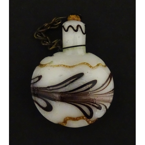 224 - A small art glass scent / perfume flask in the Venetian style. Approx. 1 1/2