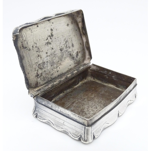 397 - A Victorian silver snuff box with engraved and engine turned decoration. Hallmarked Birmingham c.184... 