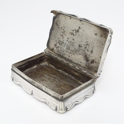 397 - A Victorian silver snuff box with engraved and engine turned decoration. Hallmarked Birmingham c.184... 