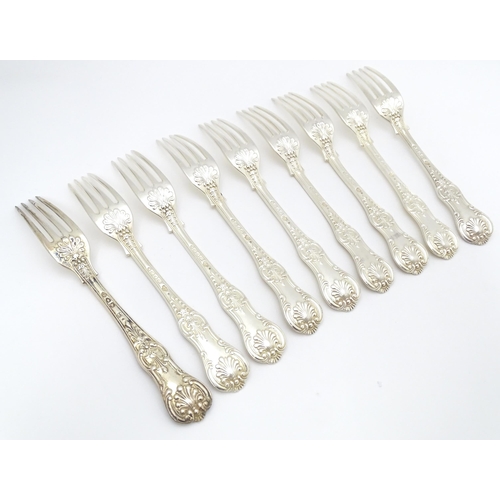 525 - Nine associated Victorian silver Kings pattern dessert forks comprising eight hallmarked London 1865... 