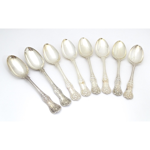 526 - Eight associated Victorian silver Kings pattern tablespoons comprising six hallmarked hallmarked Lon... 