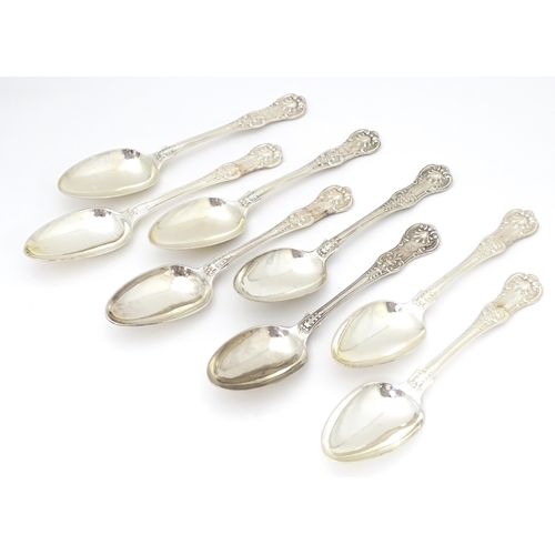 526 - Eight associated Victorian silver Kings pattern tablespoons comprising six hallmarked hallmarked Lon... 