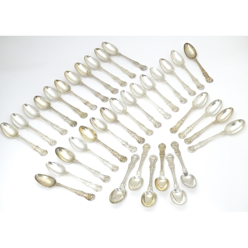 530 - Thirty six associated Victorian silver Kings pattern teaspoons comprising twelve hallmarked London 1... 