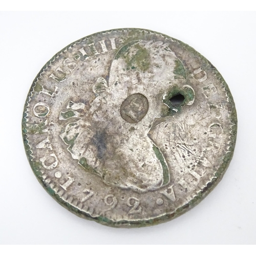 780 - Coins: A Spanish Eight Reales of King Charles IV / Carolus IIII of Spain with George III oval counte... 