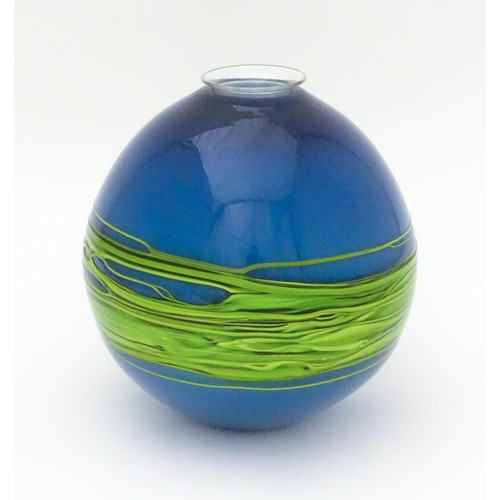 187 - An art / studio glass vase by Bob Crooks of globular form trailed with green banding over a blue gro... 