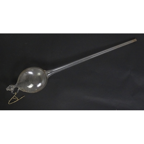 1081 - A 19thC hand blown glass wine thief, wine testing / sampling implement. Approx. 34