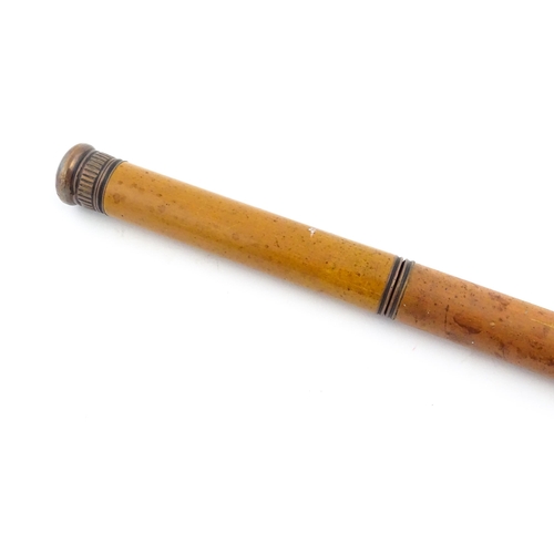 1252 - An early 20thC boxwood walking cane, the removable handle with provision for glass vial. Approx. 35 ... 