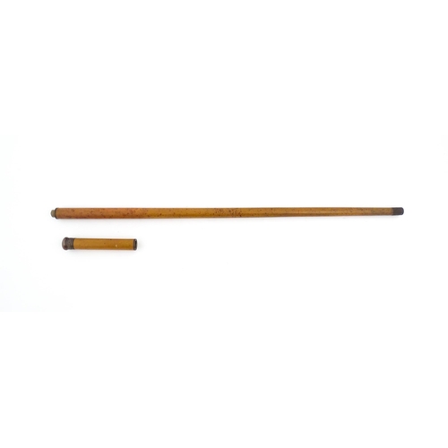 1252 - An early 20thC boxwood walking cane, the removable handle with provision for glass vial. Approx. 35 ... 