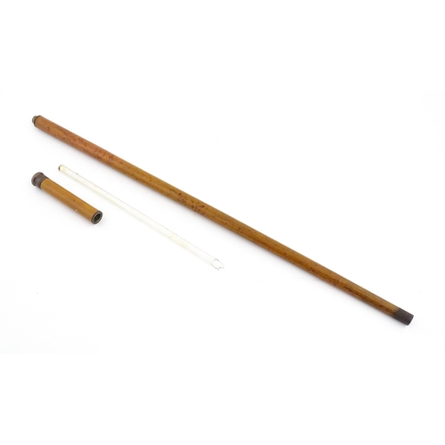 1252 - An early 20thC boxwood walking cane, the removable handle with provision for glass vial. Approx. 35 ... 